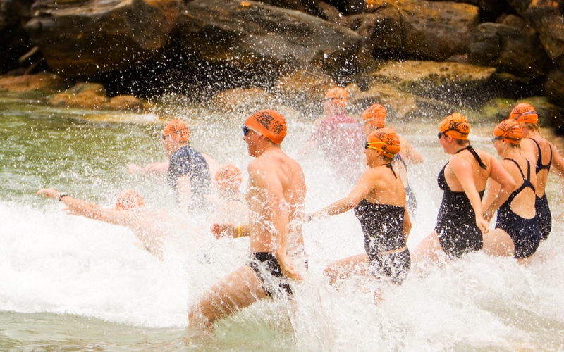 Can Tooers diving into Shelly Beach swim