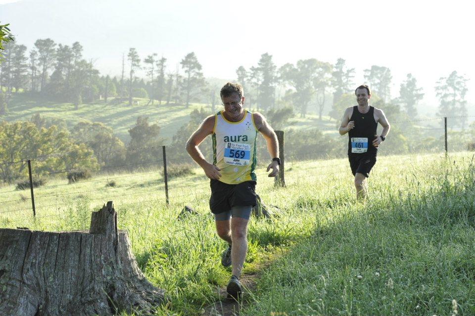 John Doughty trail running through open field