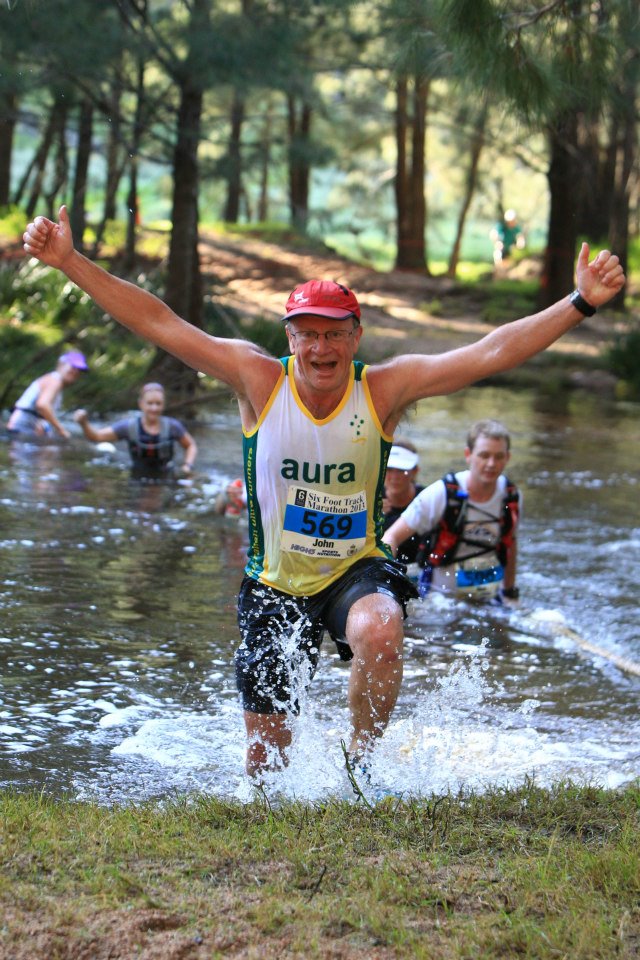 John Doughty trail running through a river